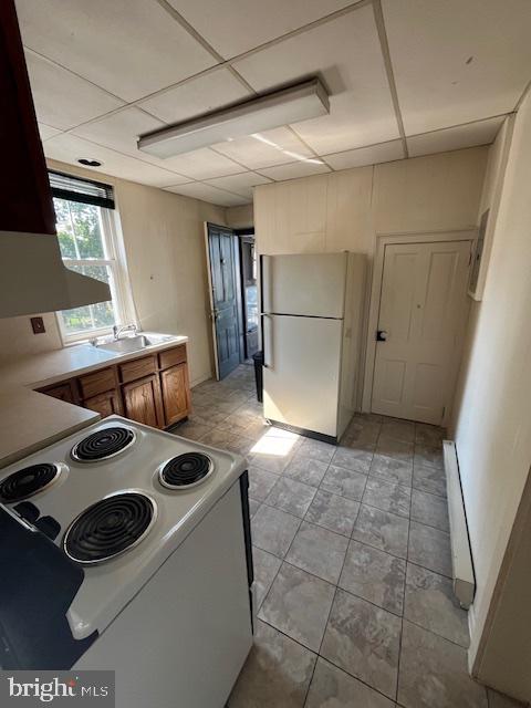 145 East Main Street, Unit 2R Mechanicsburg, PA 17055 - Photo 5 of 10 a kitchen with a stove and a refrigerator