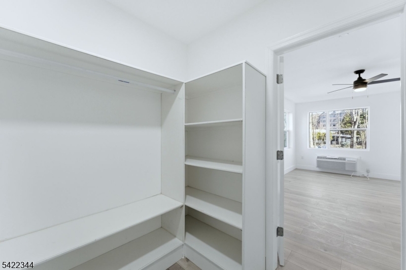 95 Shepherd Lane, Unit B302 Totowa, NJ 07512 - Photo 17 of 24 a view of an empty room with a window