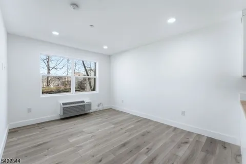 a view of workspace with wooden floor