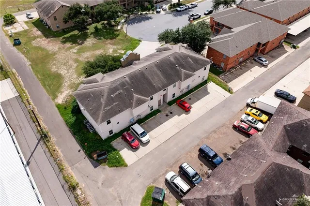 an aerial view of a house with a garden