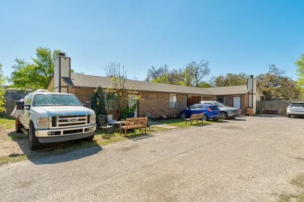 a car parked in front of a house