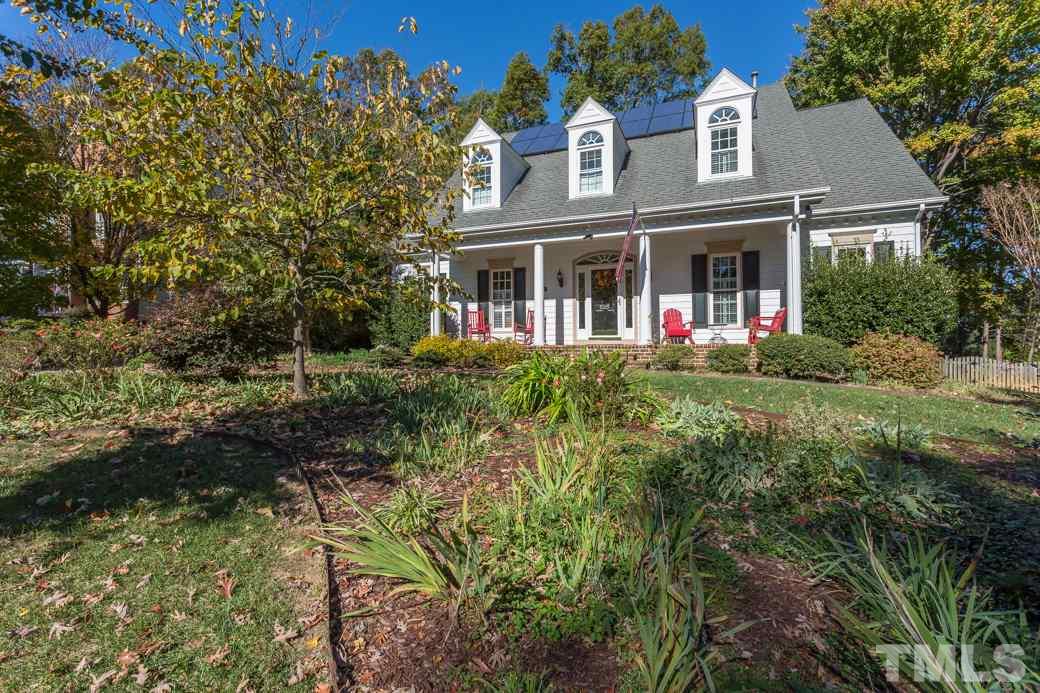 5215 Coffee Tree Drive Raleigh, NC 27613 - Photo 2 of 25 The front porch is rocking chair-ready with plenty of space for company