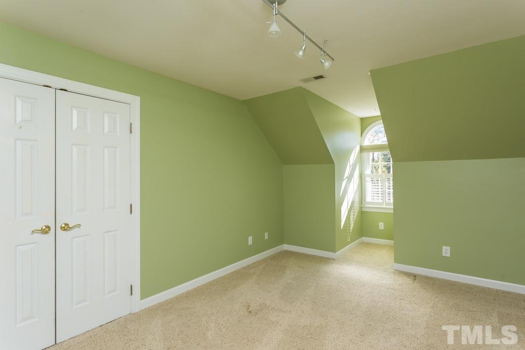 5215 Coffee Tree Drive Raleigh, NC 27613 - Photo 17 of 25 South-facing bedroom gets lots of sunshine throughout the day.