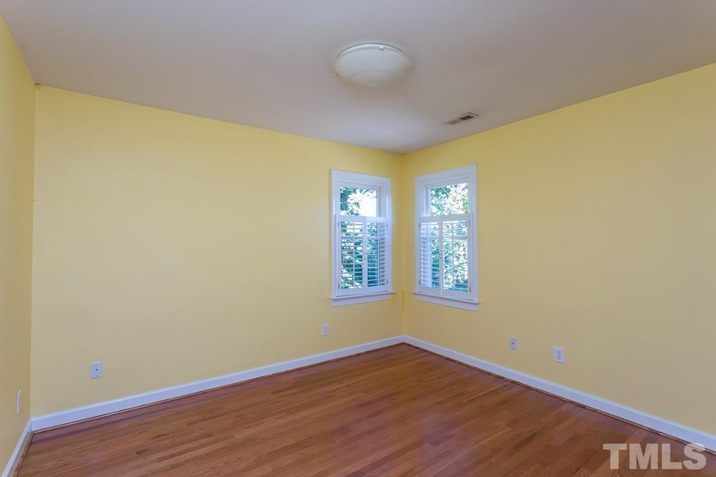 5215 Coffee Tree Drive Raleigh, NC 27613 - Photo 18 of 25 North-facing bedroom gets lots of sunshine throughout the day.
