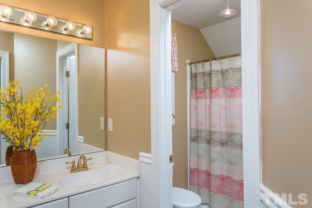5215 Coffee Tree Drive Raleigh, NC 27613 - Photo 20 of 25 Second full bathroom upstairs