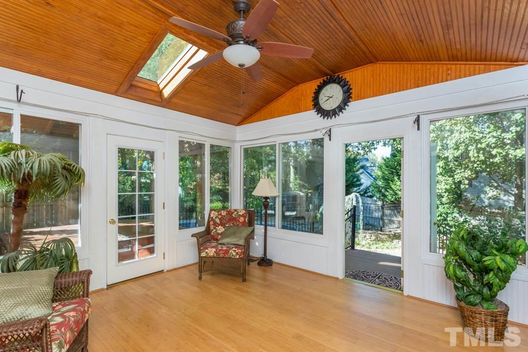 5215 Coffee Tree Drive Raleigh, NC 27613 - Photo 21 of 25 The converted sunroom is the perfect place to cozy up with a cup of tea