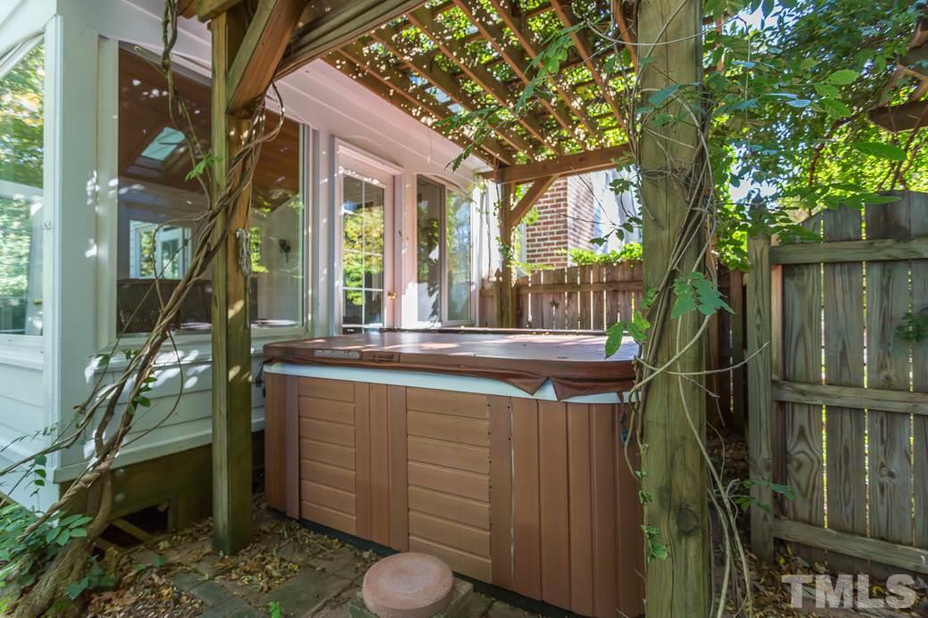 5215 Coffee Tree Drive Raleigh, NC 27613 - Photo 23 of 25 Relax in your hot tub underneath this beautiful pergola!