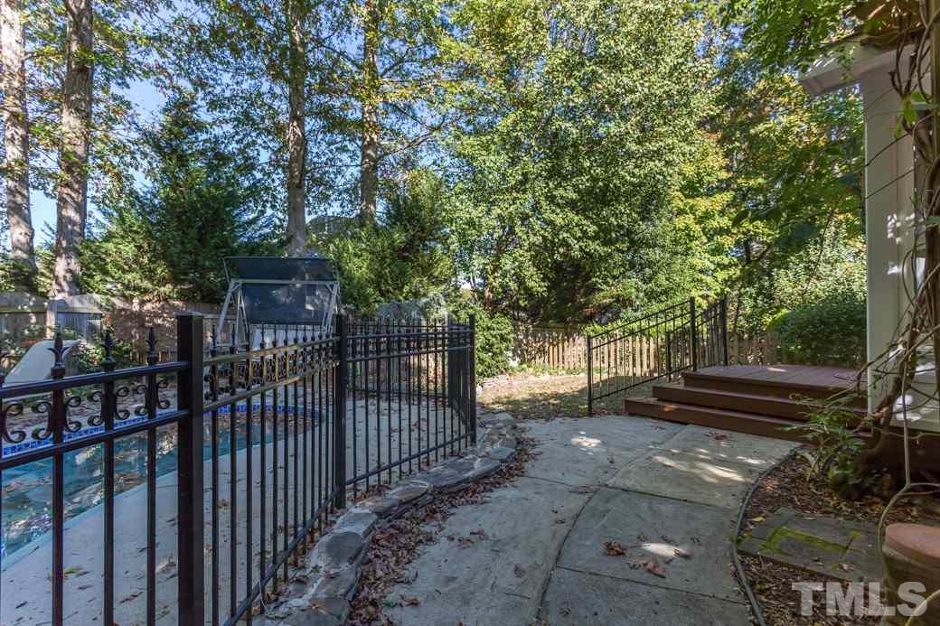 5215 Coffee Tree Drive Raleigh, NC 27613 - Photo 24 of 25 Enjoy the serenity of your backyard oasis.
