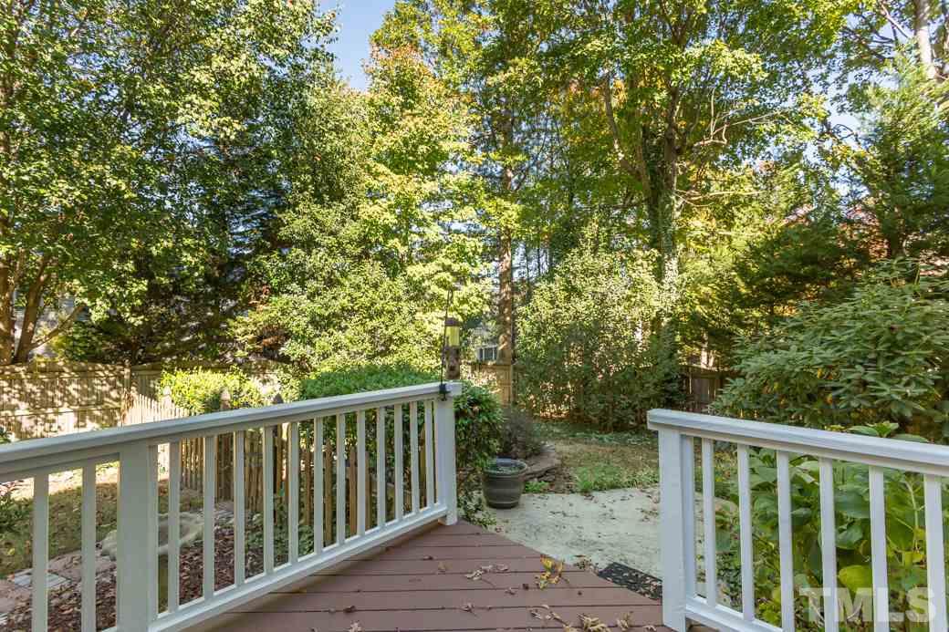 5215 Coffee Tree Drive Raleigh, NC 27613 - Photo 25 of 25 Beautiful landscaping and entertainment space means less grass to maintain!