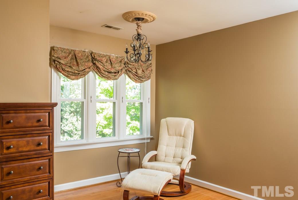 5215 Coffee Tree Drive Raleigh, NC 27613 - Photo 7 of 25 The master suite includes a sitting area large enough for two!