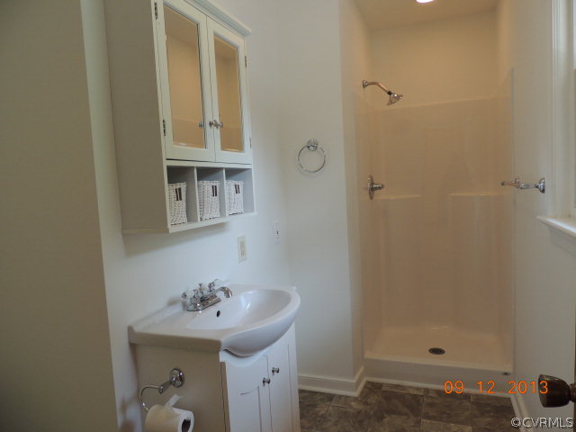 580 Guinea Road Farmville, VA 23901 - Photo 13 of 16 a bathroom with a sink and a mirror