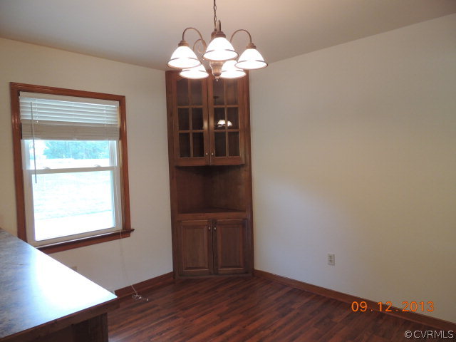 580 Guinea Road Farmville, VA 23901 - Photo 5 of 16 a view of a livingroom with wooden floor