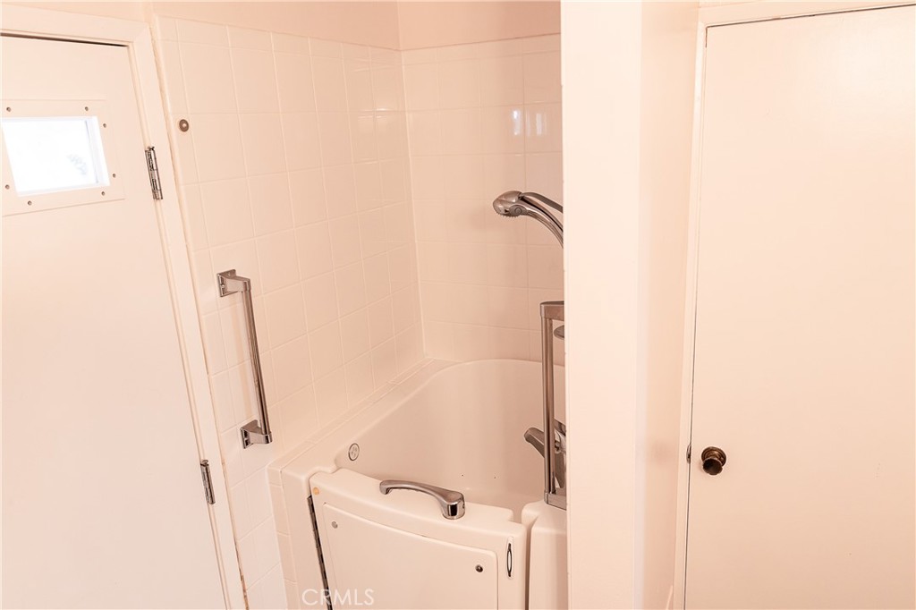 2454 Invar Court Simi Valley, CA 93065 - Photo 21 of 42 Walk-in tub and Entrance to Master