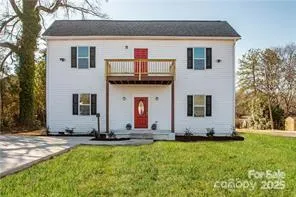 a front view of house with yard