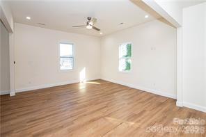 115 West Lacy Street Chester, SC 29706 - Photo 11 of 47 wooden floor in an empty room with a window