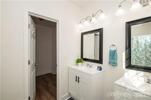 115 West Lacy Street Chester, SC 29706 - Photo 21 of 47 a bathroom with a sink and a mirror