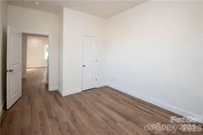 a view of small space with wooden floor