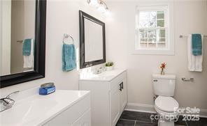 115 West Lacy Street Chester, SC 29706 - Photo 28 of 47 a bathroom with a sink toilet and mirror