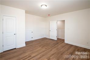 115 West Lacy Street Chester, SC 29706 - Photo 34 of 47 an empty room with wooden floor