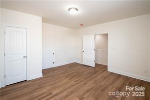 115 West Lacy Street Chester, SC 29706 - Photo 39 of 47 an empty room with wooden floor