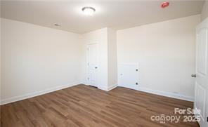 115 West Lacy Street Chester, SC 29706 - Photo 40 of 47 an empty room with wooden floor