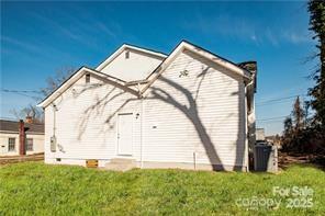 115 West Lacy Street Chester, SC 29706 - Photo 45 of 47 a backyard of a house with table and chairs