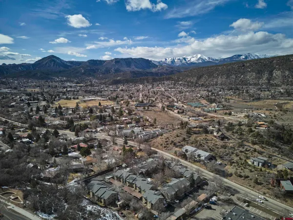 a view of a lake with mountains in the background