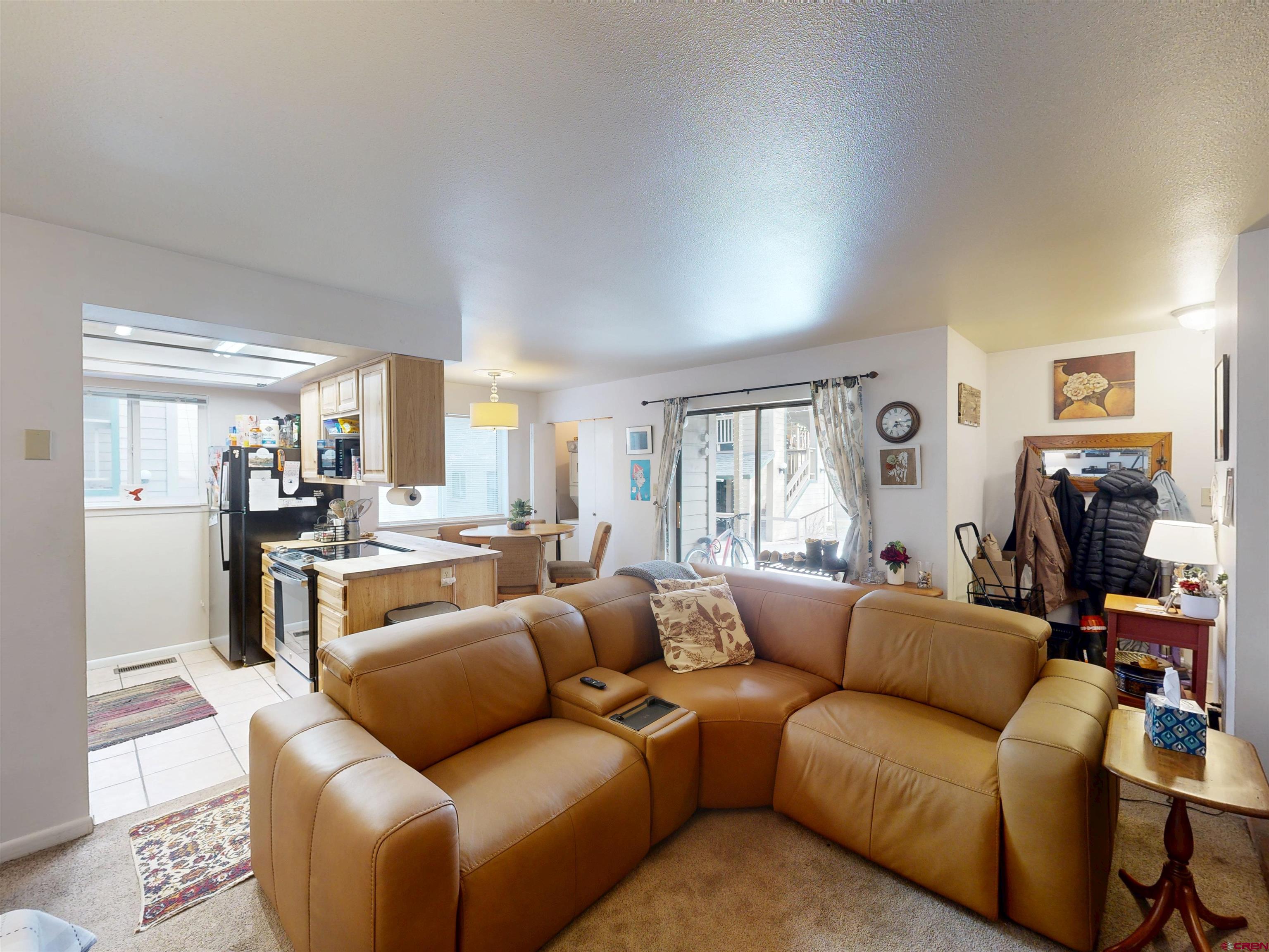 1200 Florida Road, Unit 17 Durango, CO 81301 - Photo 4 of 23 a living room with furniture or couch and a window