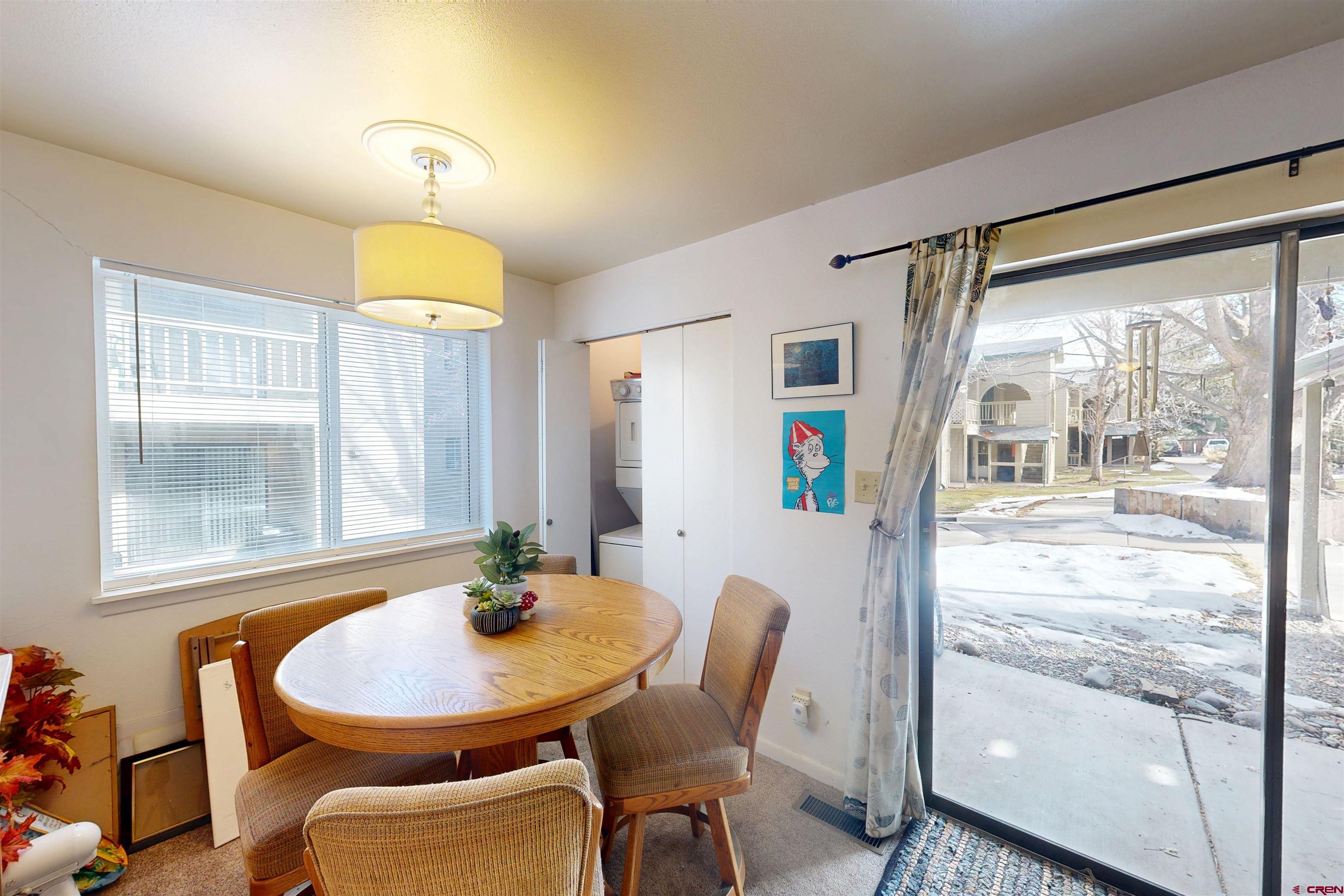 1200 Florida Road, Unit 17 Durango, CO 81301 - Photo 5 of 23 a dining room with furniture and window