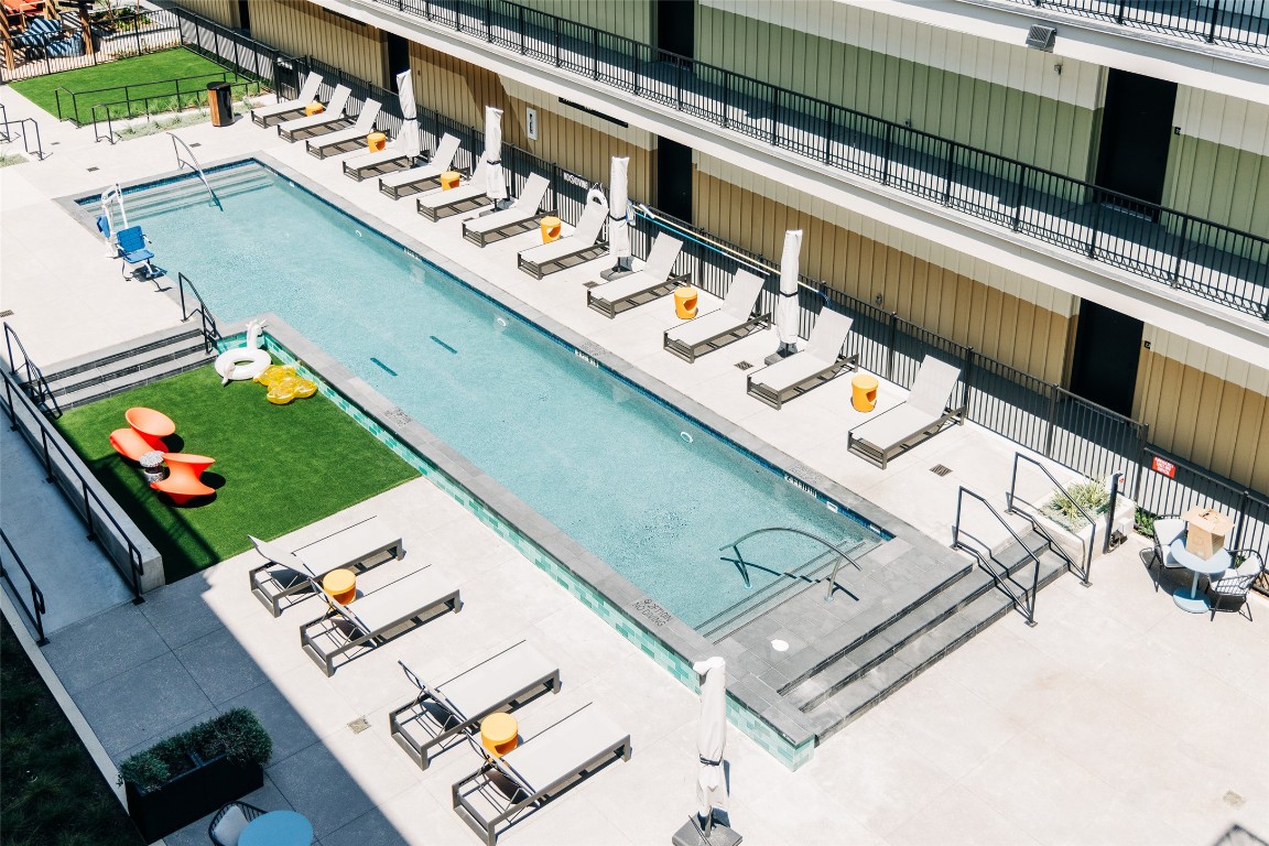 4315 South Congress Avenue, Unit 406 Austin, TX 78745 - Photo 1 of 19 a view of a two chairs in a balcony