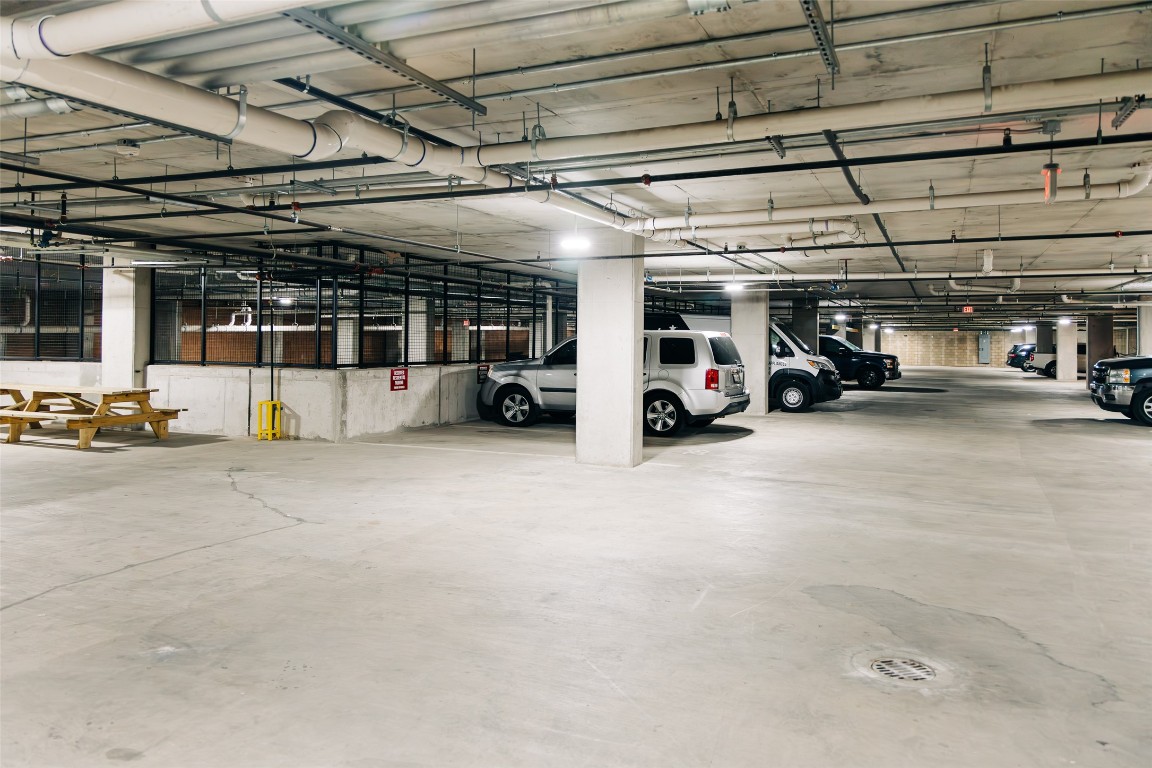 4315 South Congress Avenue, Unit 406 Austin, TX 78745 - Photo 19 of 19 a view of parking garage with cars