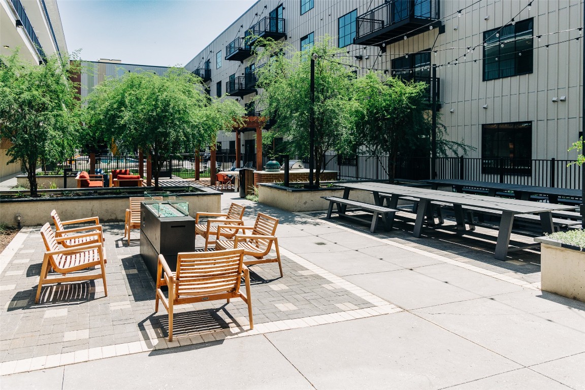 4315 South Congress Avenue, Unit 406 Austin, TX 78745 - Photo 2 of 19 a view of a chairs and tables in the patio