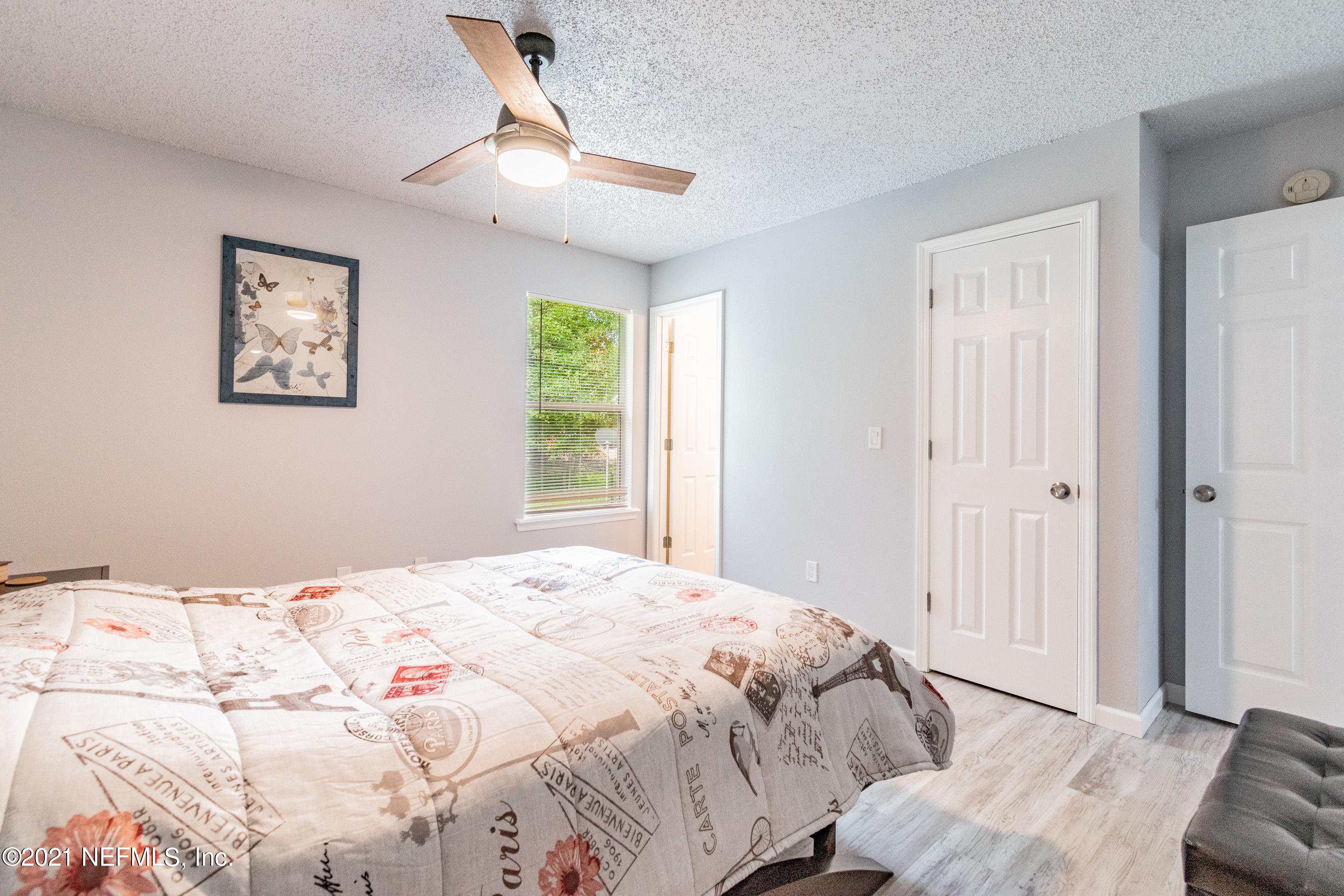 2154 Brooklyn Road Jacksonville, FL 32209 - Photo 15 of 37 a bedroom with a bed and a window