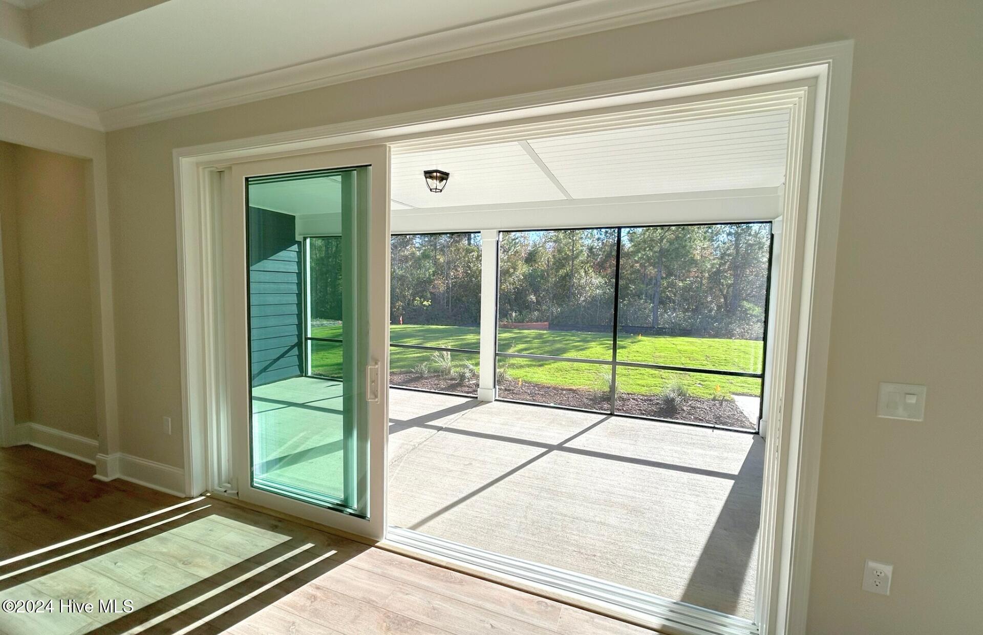 7523 Gorse Drive, Unit 38 Leland, NC 28479 - Photo 19 of 52 Large Glass-Sliding Doors to Truly Open Up the Space!