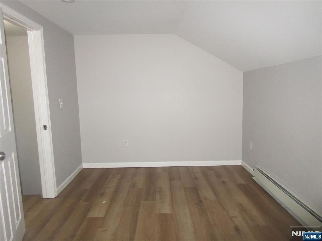 437 7th Avenue Newark, NJ 07107 - Photo 6 of 7 a view of small space with wooden floor