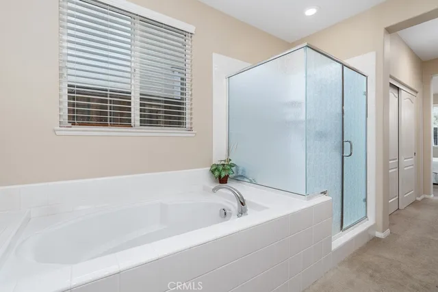 a white toilet sitting in a bathroom