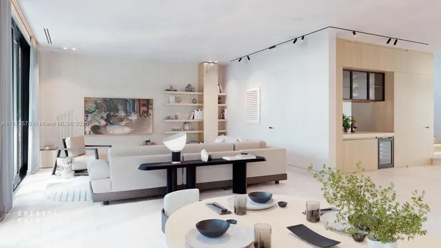 a living room with furniture and flowers