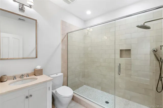 a view of a field with an ocean