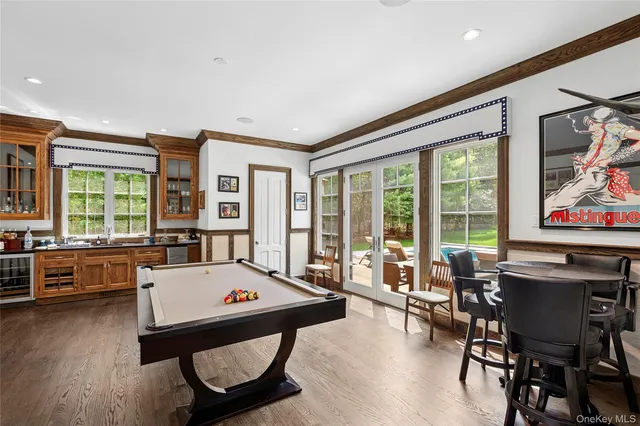 a spacious bedroom with a bed and a window