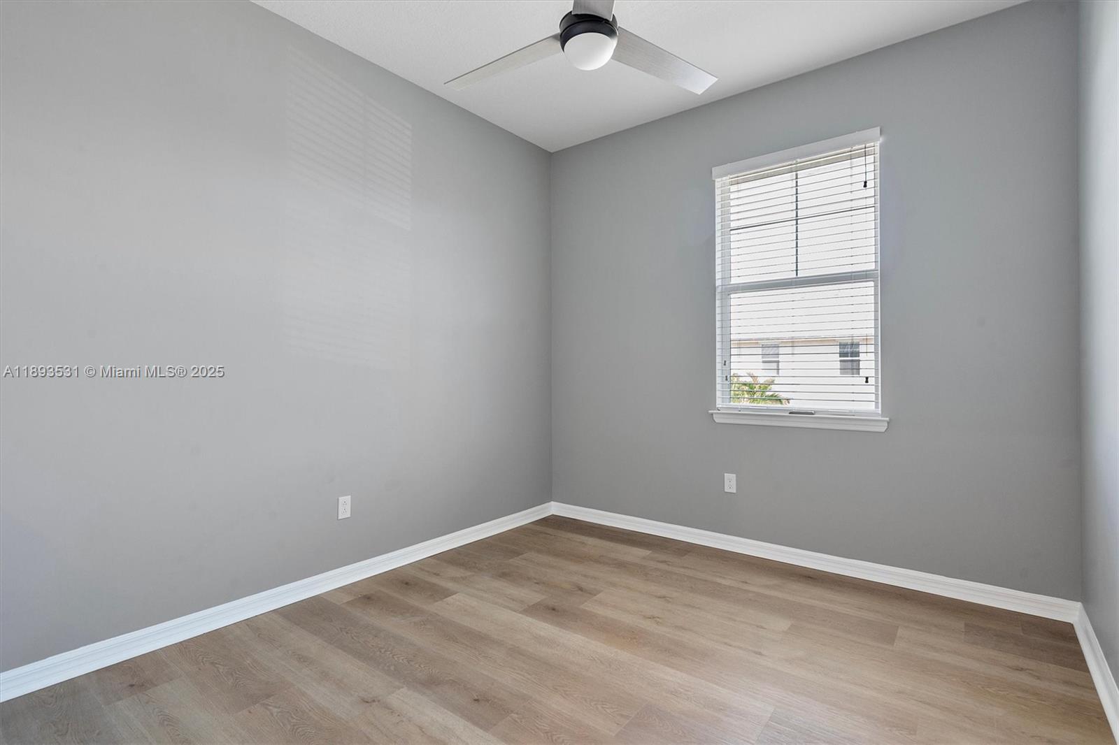 1240 Eucalyptus Drive, Unit 1 Hollywood, FL 33021 - Photo 11 of 20 an empty room with a window