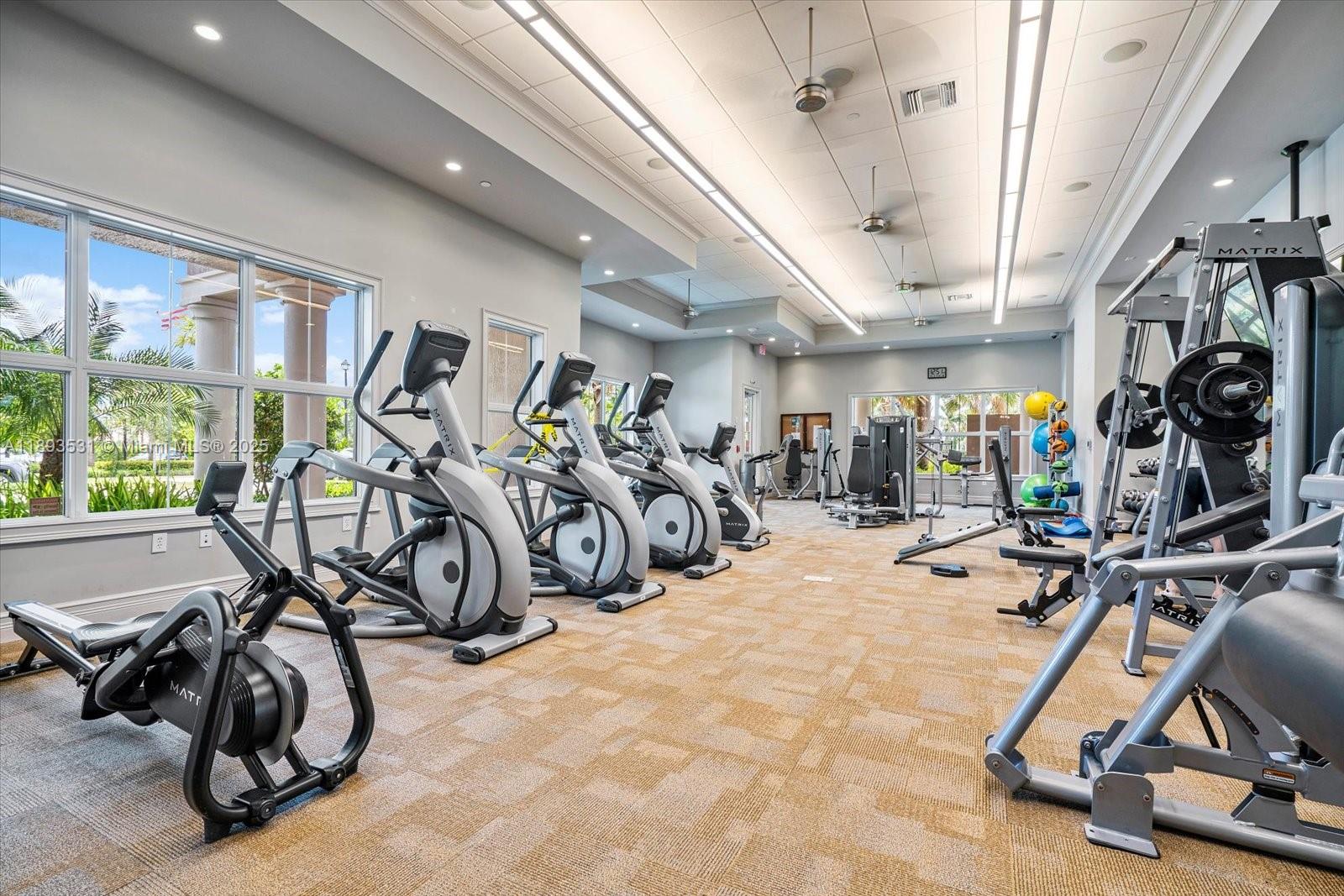 1240 Eucalyptus Drive, Unit 1 Hollywood, FL 33021 - Photo 18 of 20 a view of a room with gym equipment