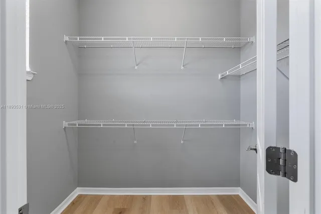 a view of a room with racks on the wall