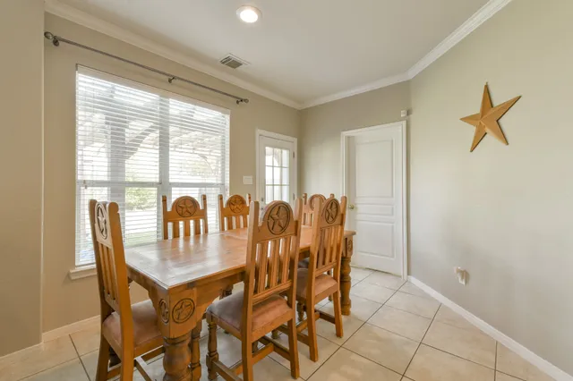 a view of a dining room with furniture
