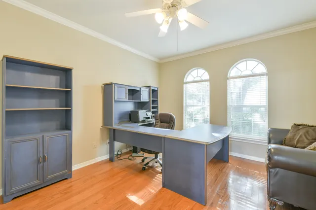 a view of a livingroom with furniture and window
