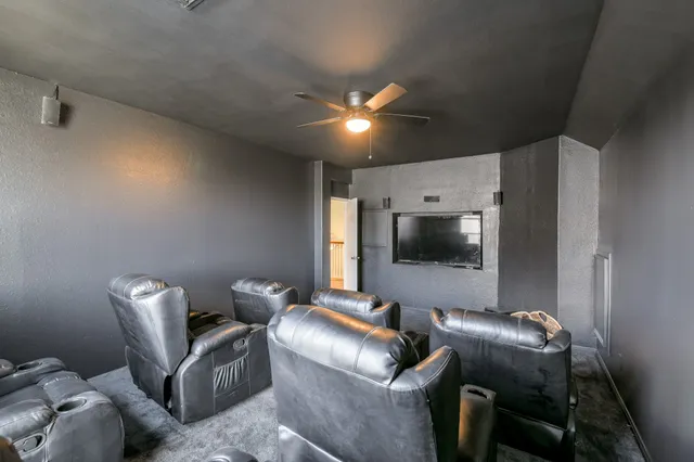 a room with furniture and a flat screen tv