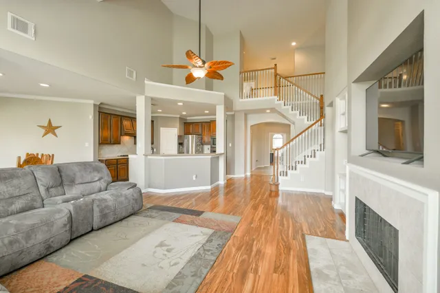 a living room with furniture and a fireplace