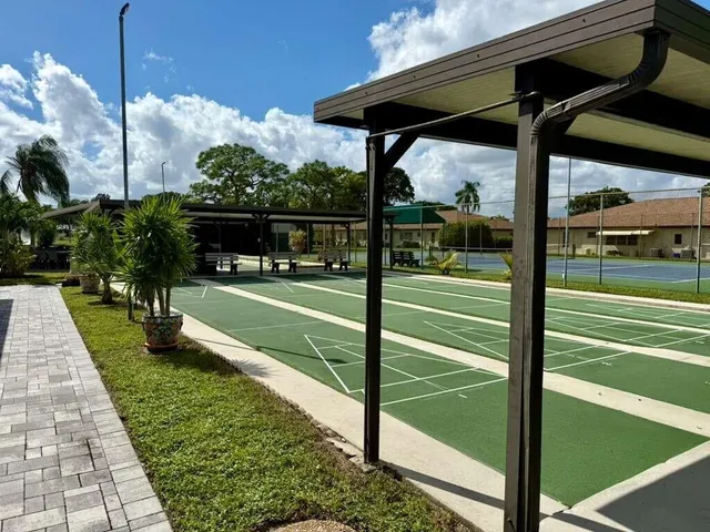 a view of a sign in front of a house