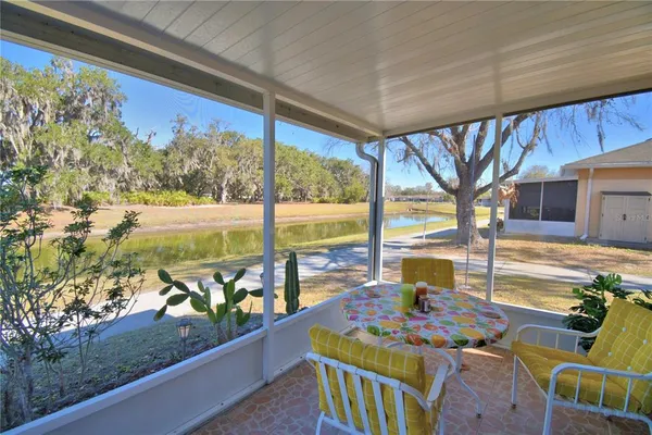 a view of an outdoor dining space with furniture