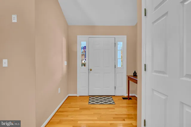a view of fireplace with wooden floor