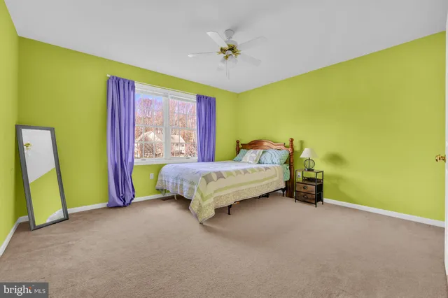 a view of a bathroom from the hallway